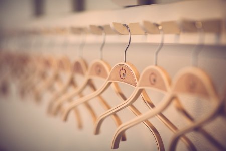 Close-up Of Clothes Hanging In Store photo