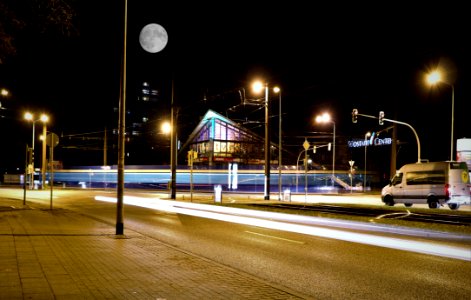 Illuminated Street Lights At Night photo