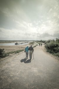 Elderly Couple Walking Together photo