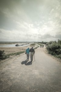 Elderly Couple Walking Together