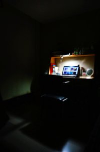 Black Laptop In Study Table Near Lamp photo