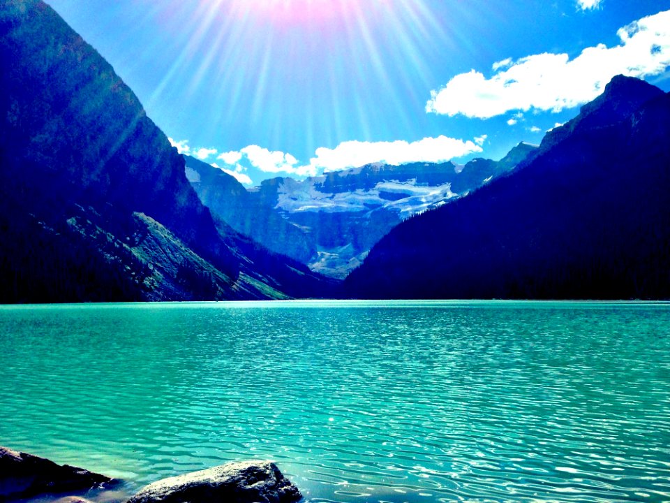 Scenic View Of Lake And Mountains Against Sky photo