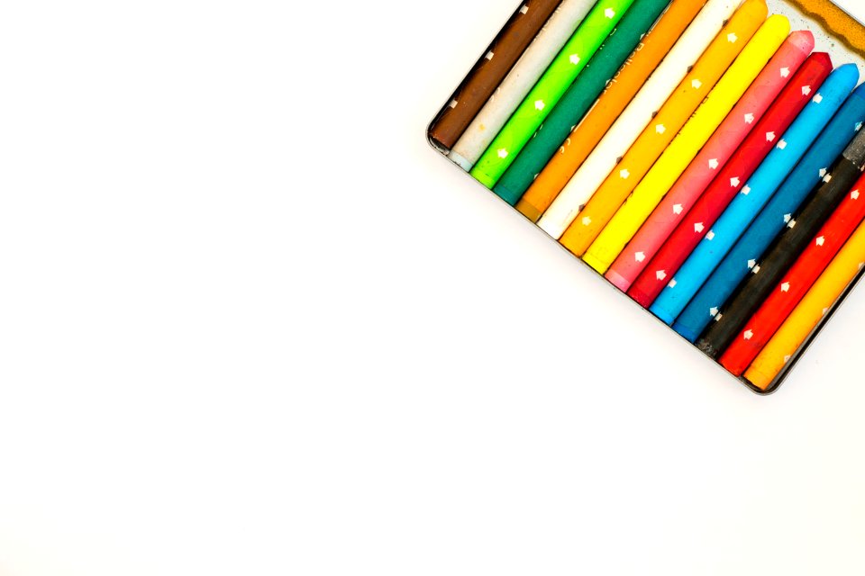 Multi Colored Pencils Over White Background