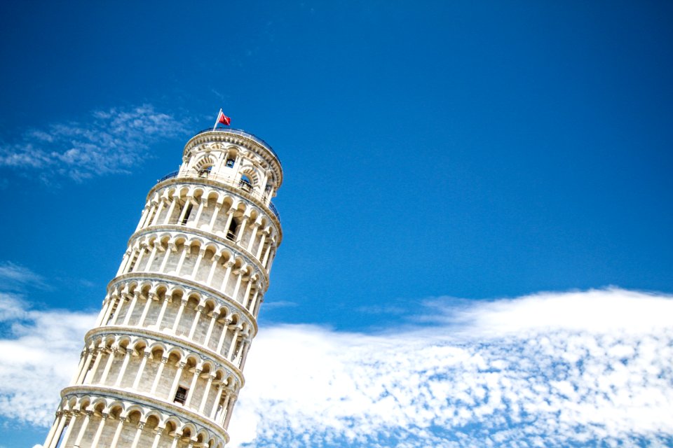 Low Angle View Of Tower Against Blue Sky photo