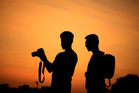 Photographer At Sunset