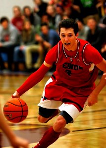 Basketball Player Wearing Red And Black Jersey photo