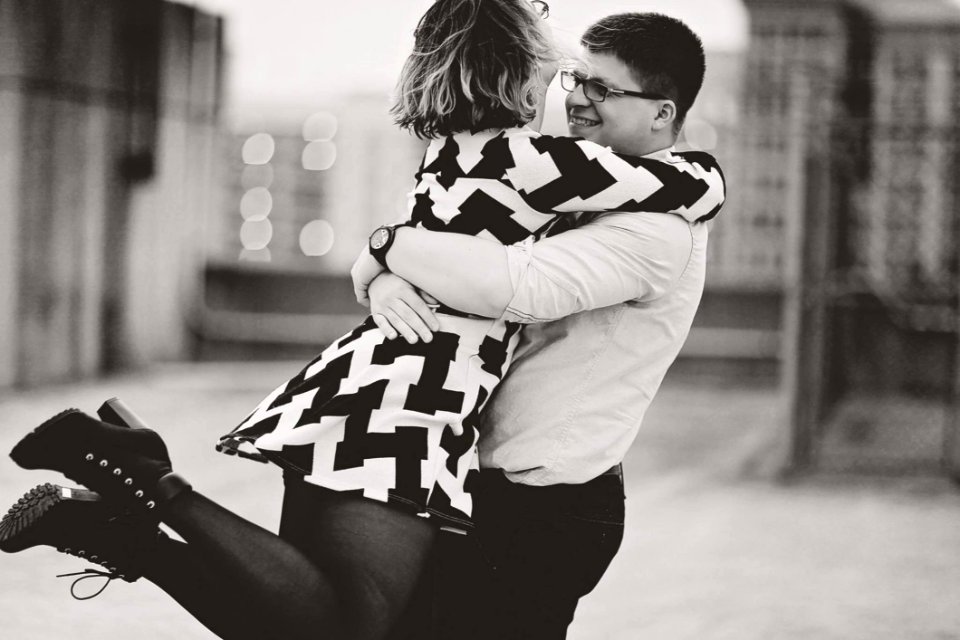 Rear View Of Couple Walking In City photo