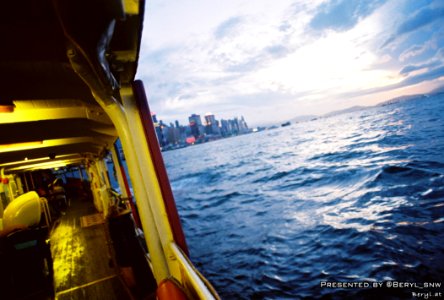 Capturing Sunset While Crossing The Victoria Harbour