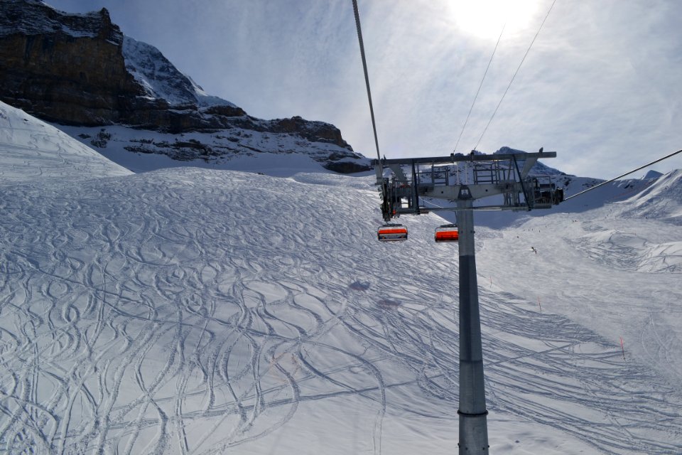 Ski Lift On Snowy Landscape