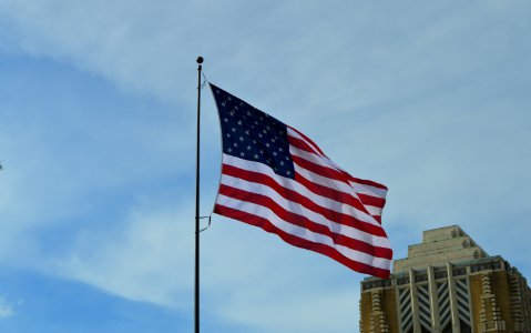 America Flag Under Blue Sky At Daytime