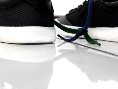 Close-up Of Shoes Against White Background