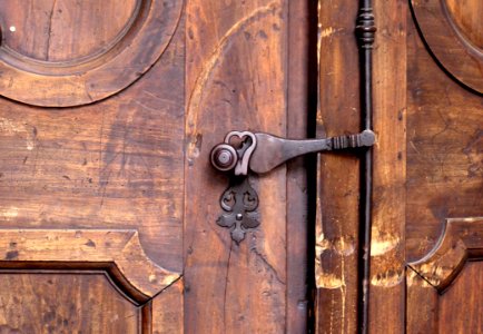 Brass Door Knob On Wooden Door photo