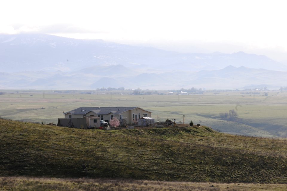 House On Hilly Farmland 1