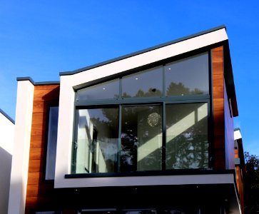 Modern Building Against Blue Sky photo