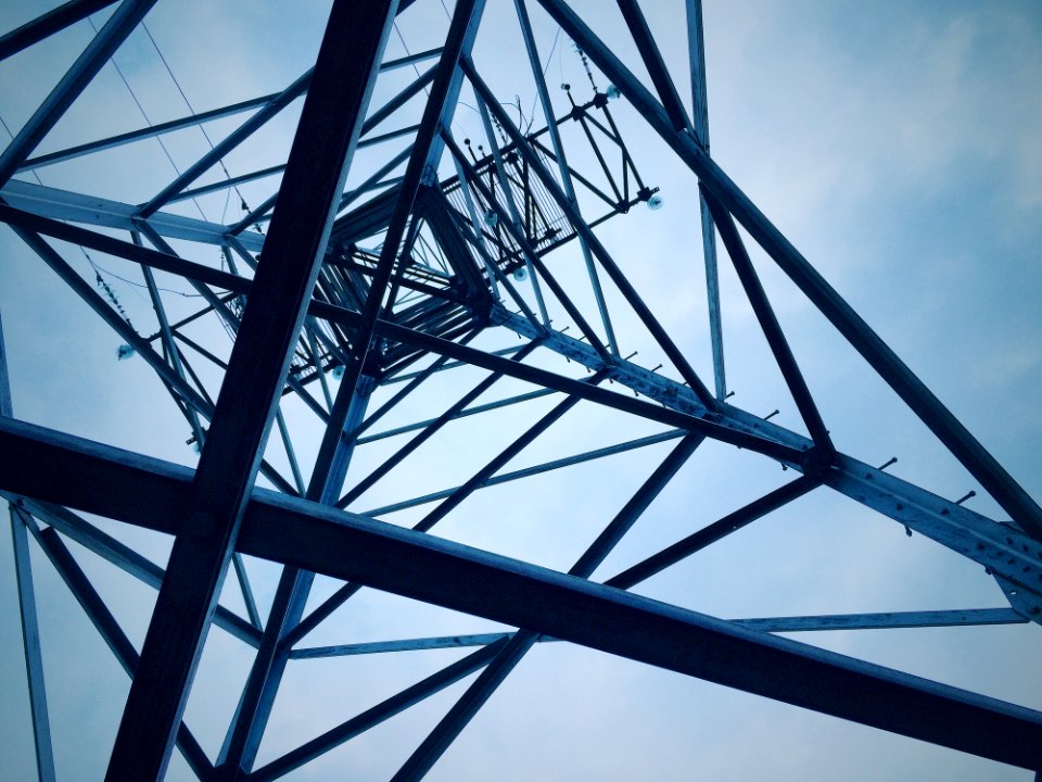 Low Angle View Of Electricity Pylon Against Sky