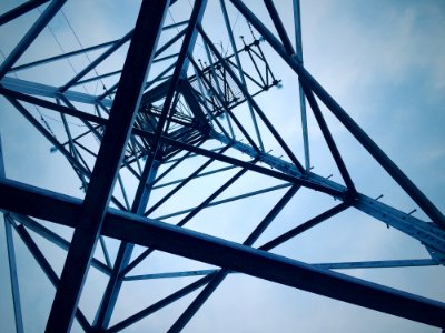 Low Angle View Of Electricity Pylon Against Sky