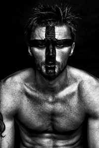 Portrait Of Man With Painted Face