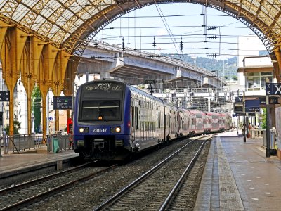 Blue And Gray Train On Station During Daytime