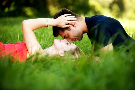 Couple Lying In Grass photo