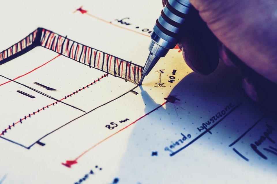 Person Making A Cabinet Plan