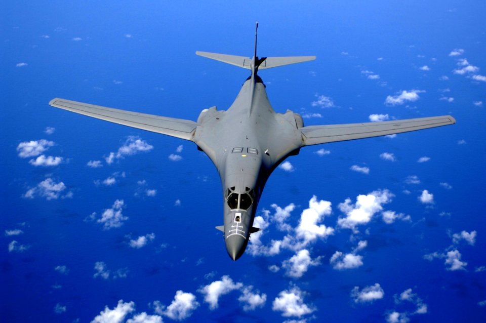 Black Fighter Jet Near White Clouds