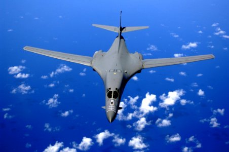 Black Fighter Jet Near White Clouds