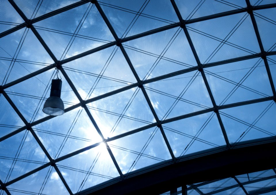 Photo Of Black Frame Glass Ceiling During Daytime