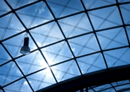 Photo Of Black Frame Glass Ceiling During Daytime photo