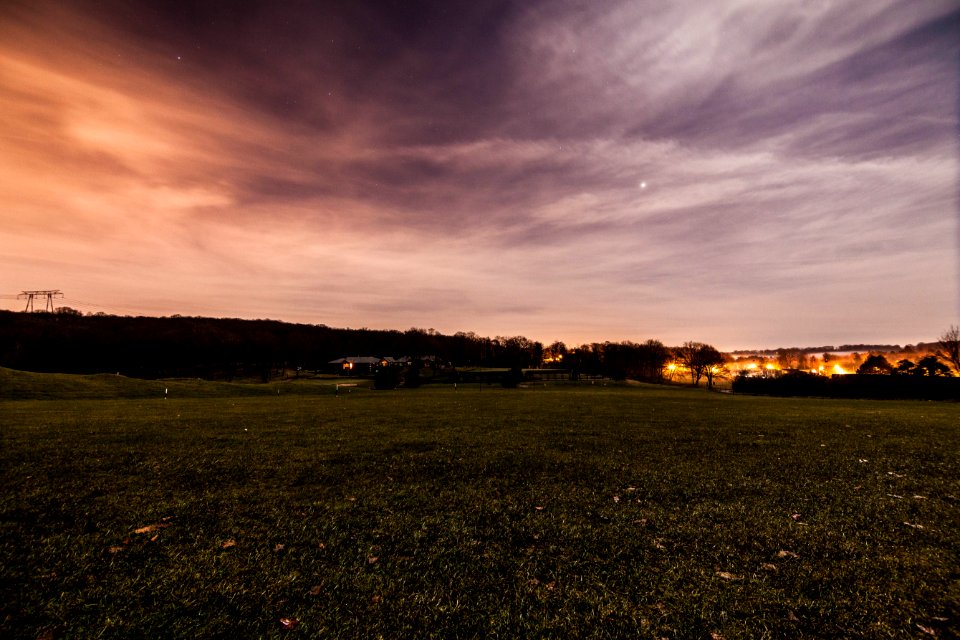 Green Field Under Cloudy Sky During Daytime photo