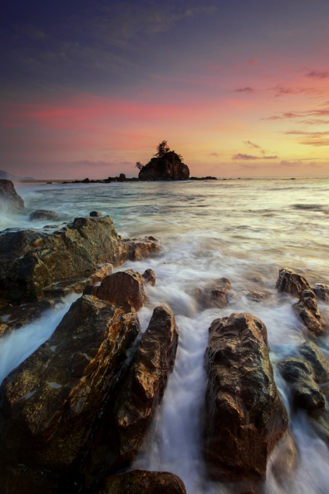 Running Water On Brown Rocks During Yellow Sunset photo