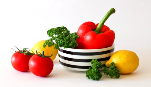 Red Tomato Green Broccoli Red Bell Pepper And Yellow Lime photo