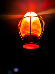 Close-up Of Illuminated Lantern At Night photo