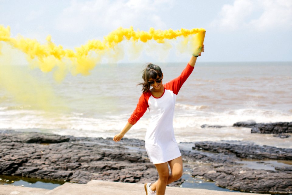 Woman Standing On Beach