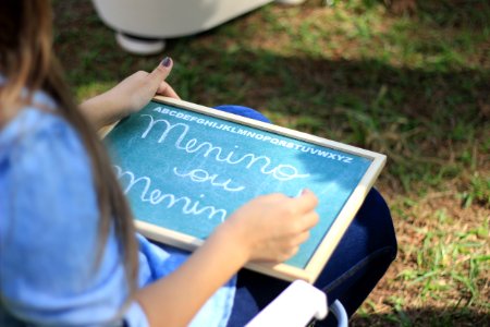 Girl Practicing Her Alphabet photo