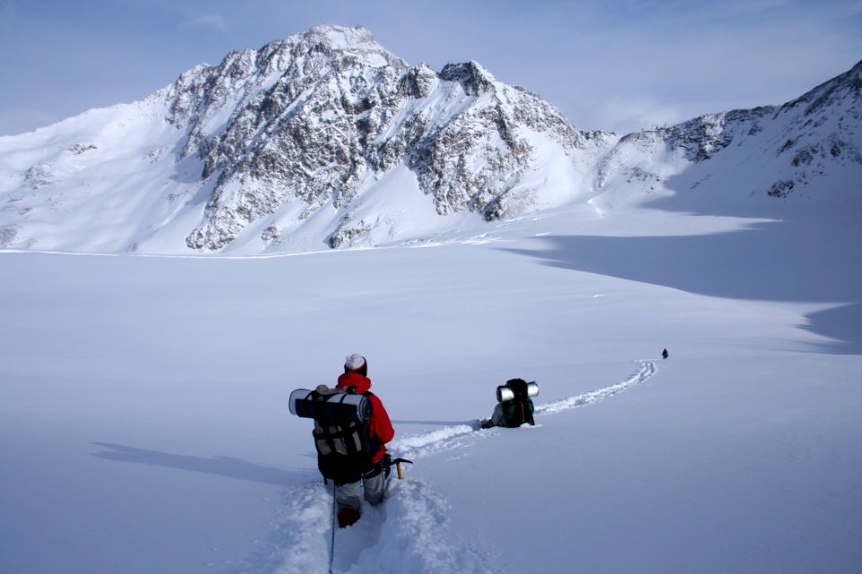 Hiker In Snow On Mountains