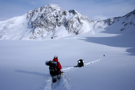 Hiker In Snow On Mountains
