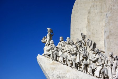 Statue On Roof Under White And Blue Sky photo