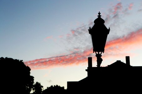 Silhouette Of Street Lamp Under Clouds photo