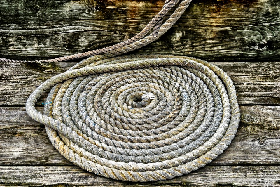Grey Braided Rope On Wooden Plank