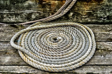 Grey Braided Rope On Wooden Plank