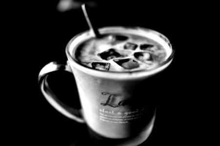 Grayscale Photo Of Cup With Ice Cubes