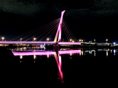 Illuminated Bridge At Night