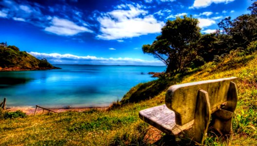 Scenic View Of Sea Against Blue Sky photo