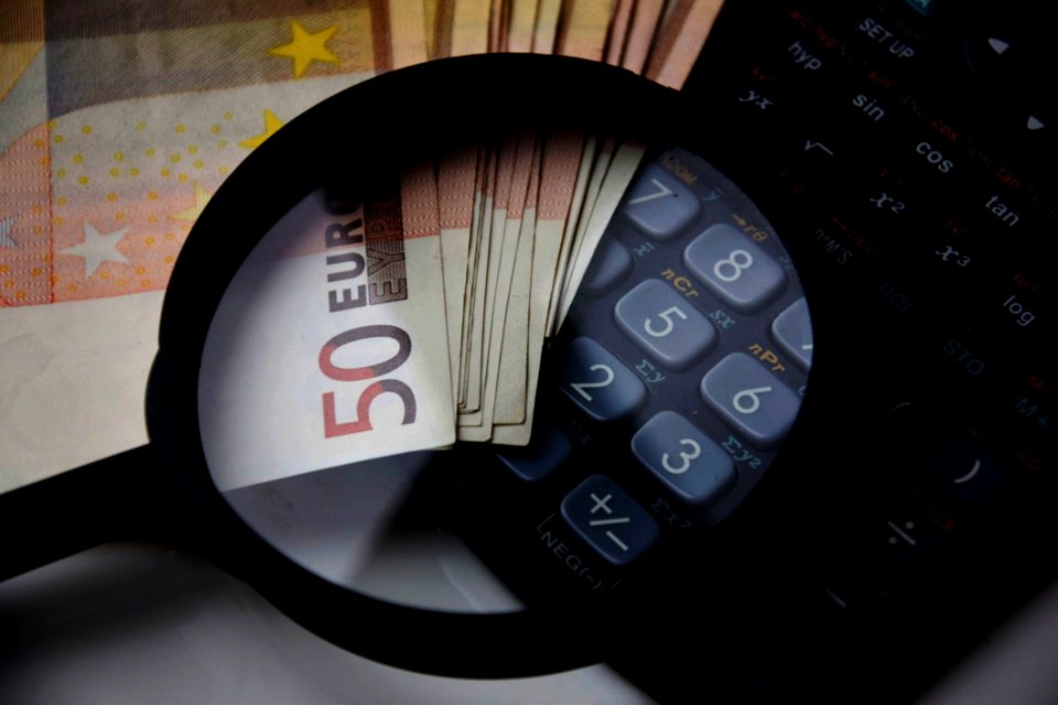 Euro Notes With Magnifying Glass