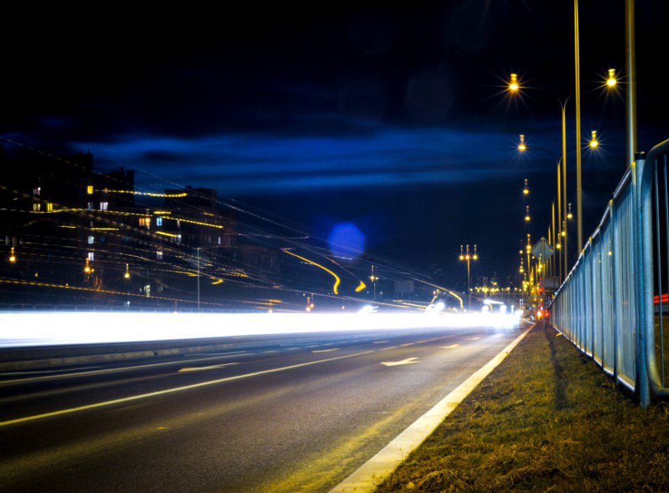 Car Headlights On Street At Night