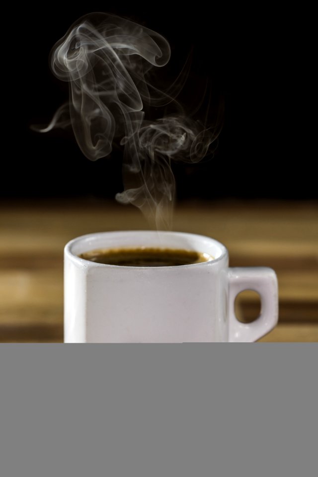 White Ceramic Mug With Coffee photo