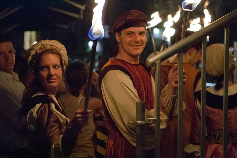 Medieval pageant costumes torches