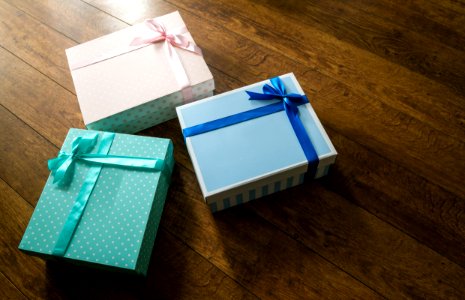 Colorful Gift Boxes On Wooden Floor photo
