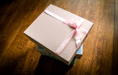 Colorful Gift Boxes On Wooden Floor photo