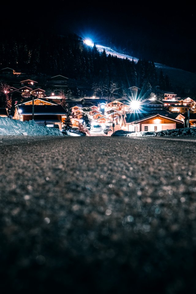 High Angle View Of Crowd On Illuminated City At Night